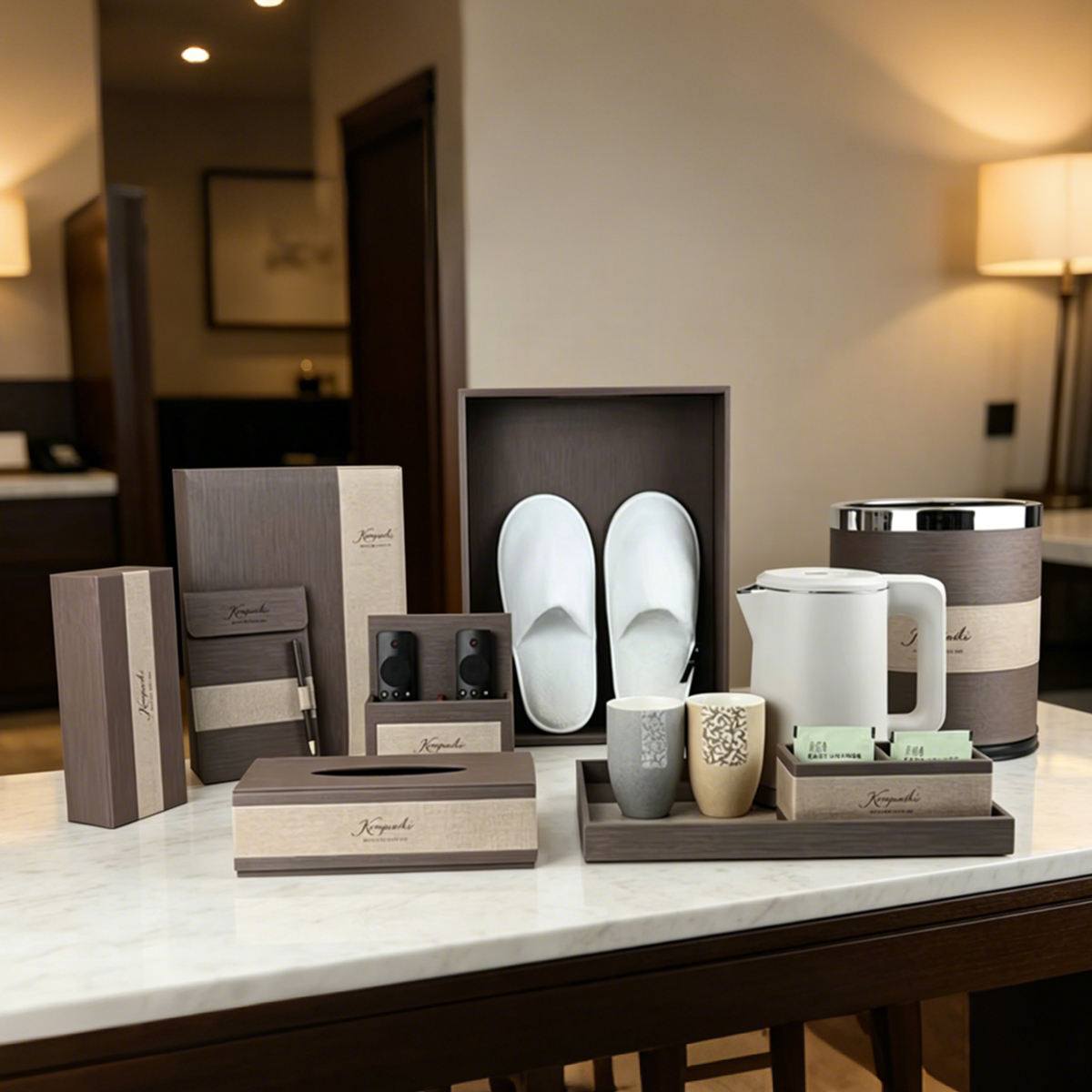 Custom-made luxury leather hotel amenity set. Room and bathroom amenities boxes made of faux leather, including a tray and tissue box.