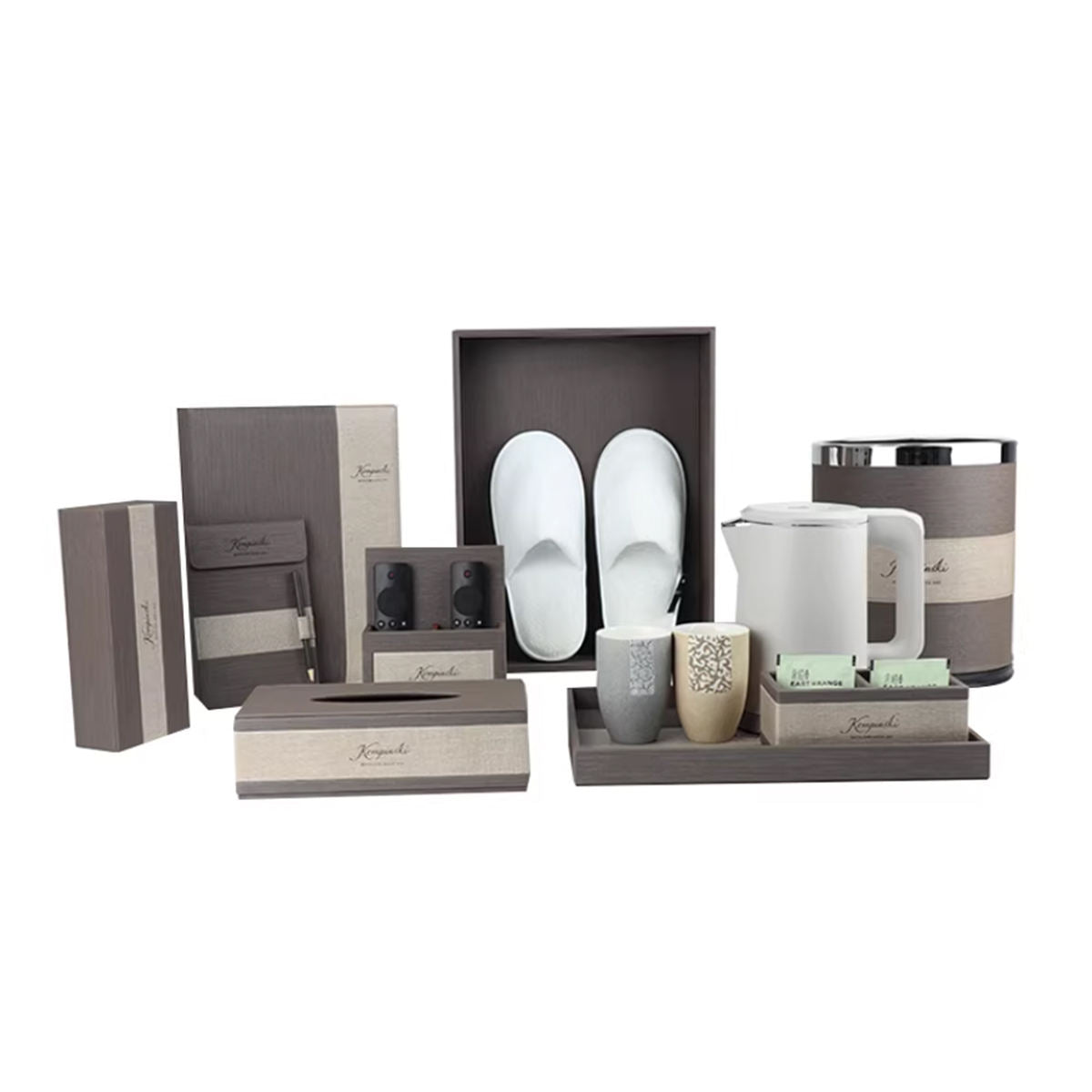 Custom-made luxury leather hotel amenity set. Room and bathroom amenities boxes made of faux leather, including a tray and tissue box.